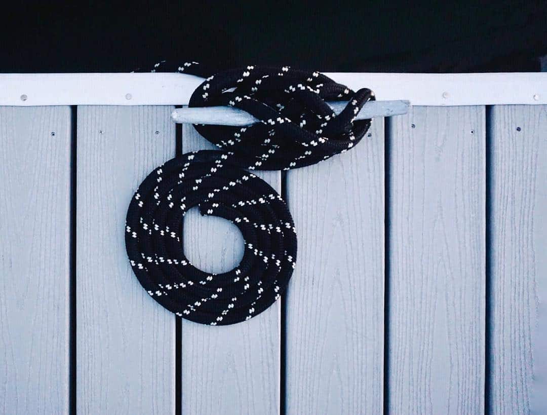 Top view of a mooring line on a dock