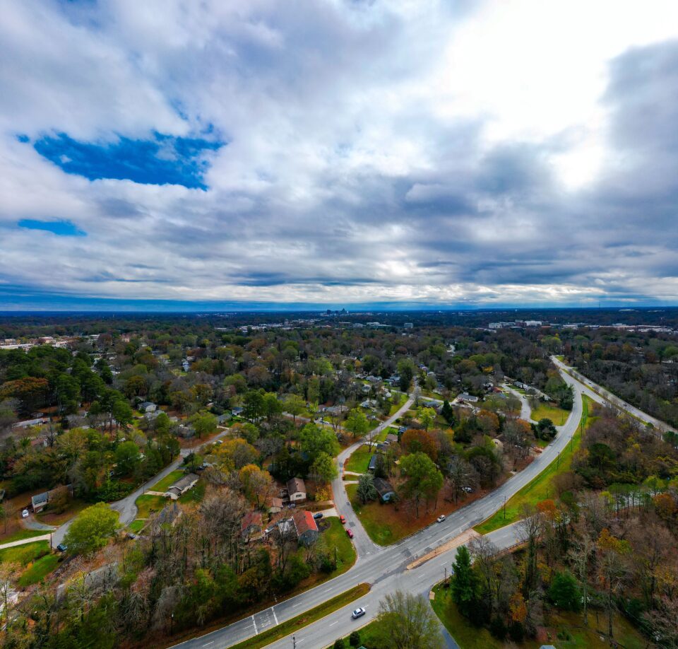 team member at decks and docks doing inventory in lumber yard