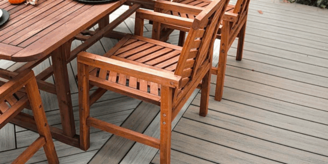 a deck built with deckorators decking with patio furniture