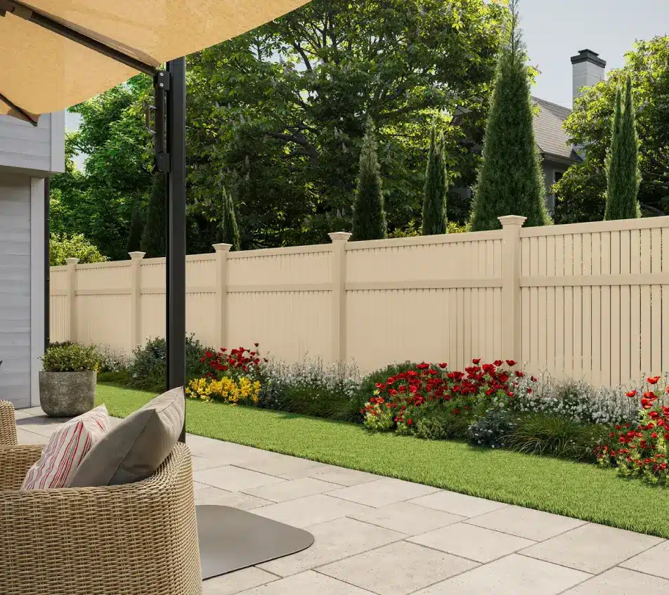 white vinyl fence bed of flowers