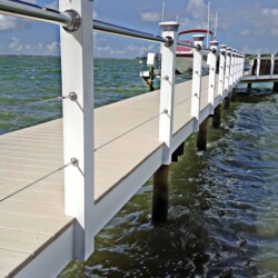 Azek decking in Slate Gray, Atlantis Rail stainless steel top rail, vinyl post sleeves. , Lighting & Railing