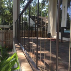 Verticable in Bronze , Lighting & Railing