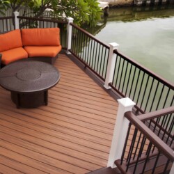 Decking: Trex Transcend in Tiki Torch. Railing: Trex Transcend in Tree House , Lighting & Railing