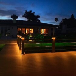 Trex Decking in Spiced Rum with Azek Premier Rail in Kona with Stainless Steel Cable , Lighting & Railing