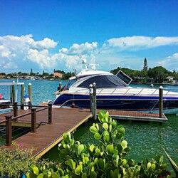 Trex Decking in Spiced Rum with Azek Premier Rail in Kona with Stainless Steel Cable , Lighting & Railing