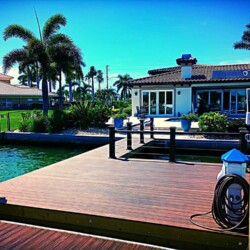Trex Decking in Spiced Rum with Azek Premier Rail in Kona with Stainless Steel Cable , Lighting & Railing